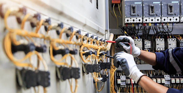 Professional Electrician technician working in Forest Heights, MD